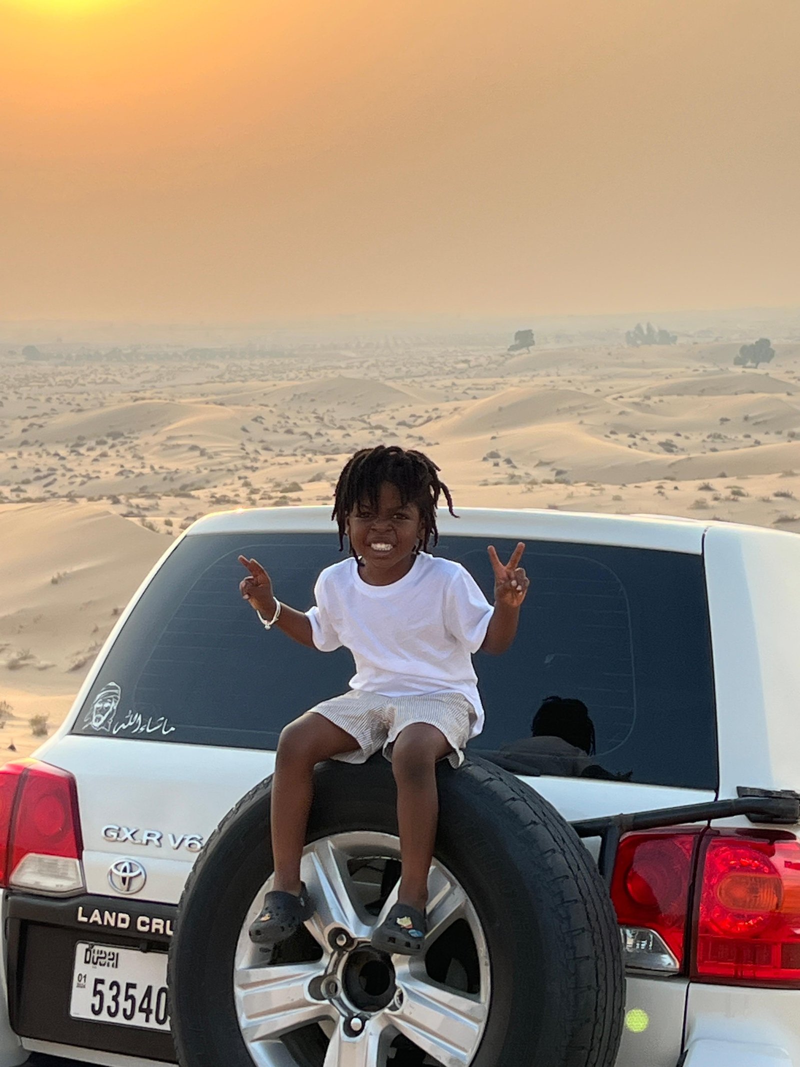 Guests on an Abu Dhabi desert safari tour
