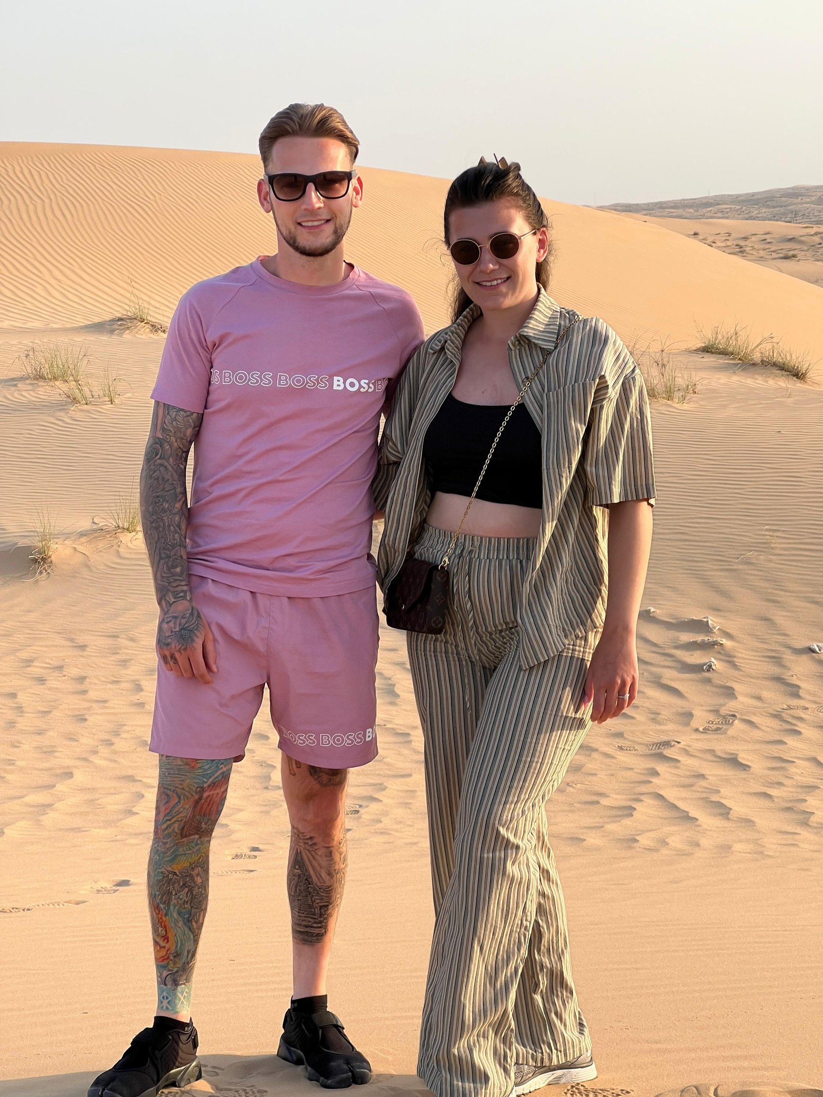 Happy tourists in the Abu Dhabi desert