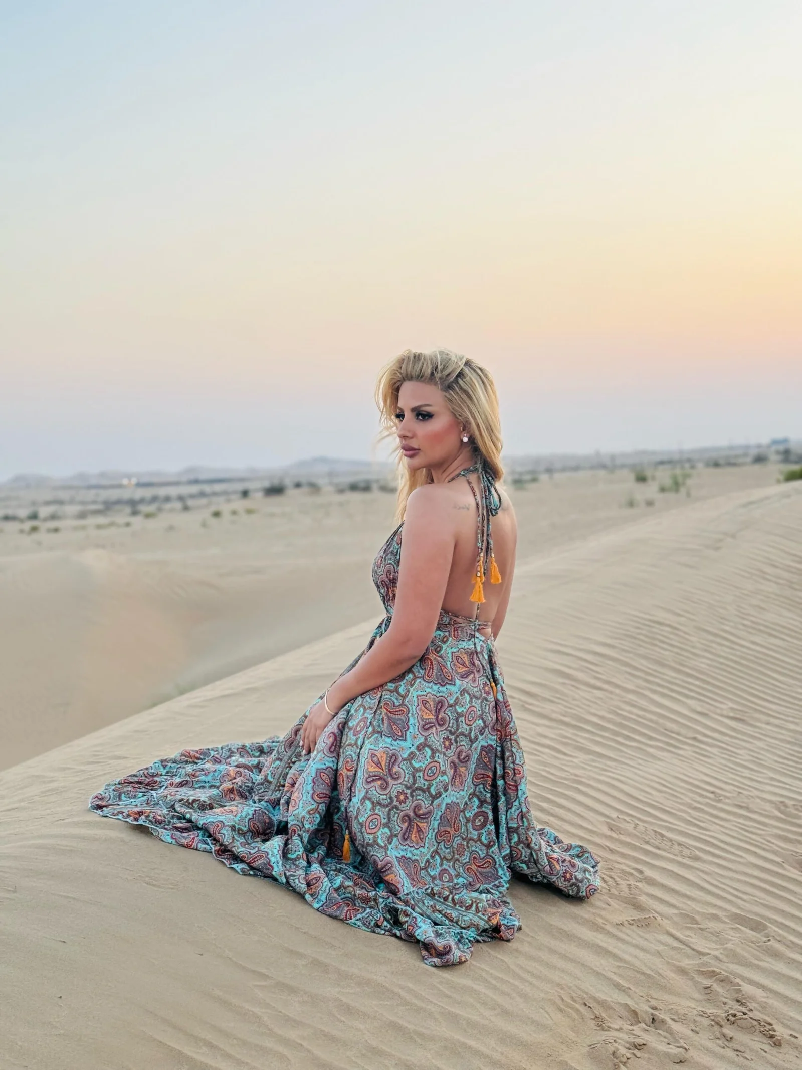 Quiet rolling dunes at an Abu Dhabi overnight desert camp